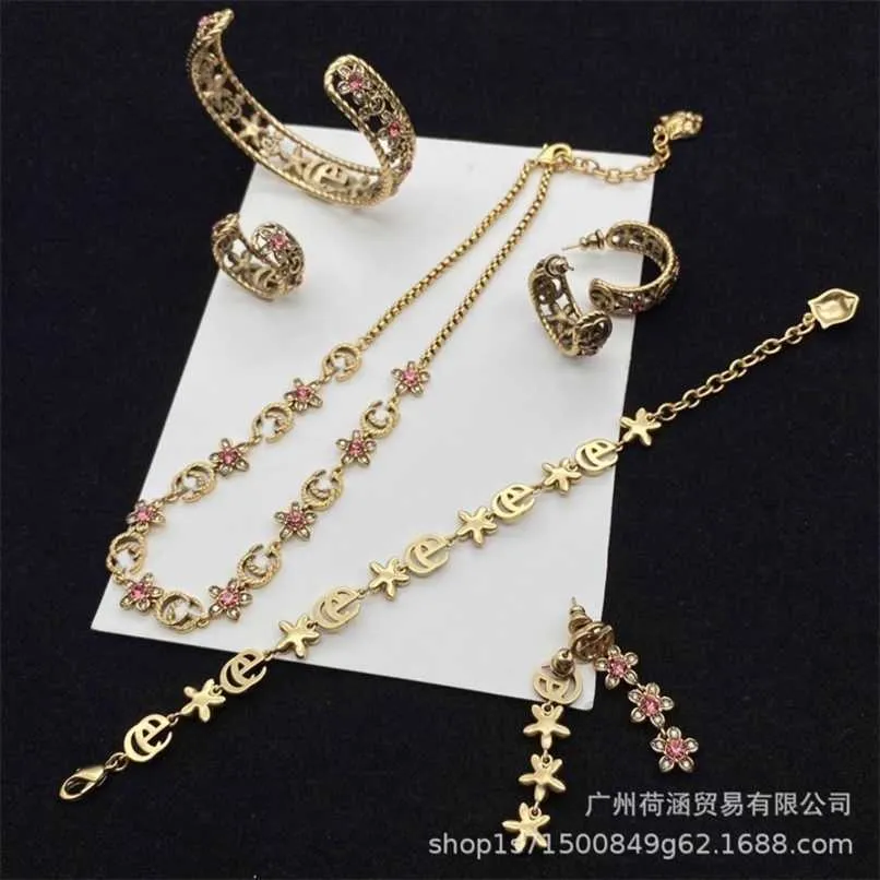 70% rabatt designer smycken armband halsbands ring blomma forntida set armband ringörhängen örhängen mångsidig gudinna