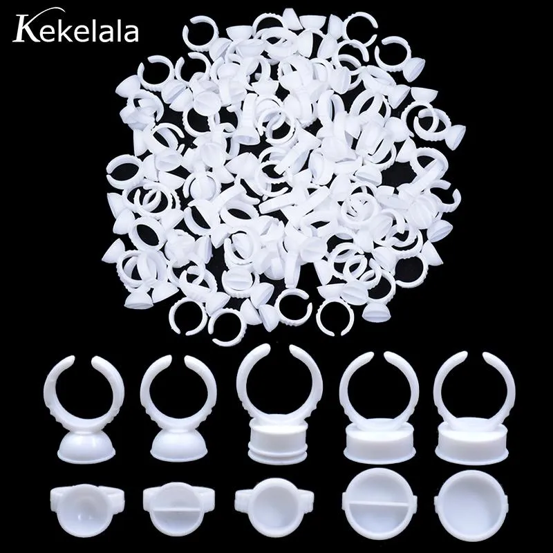 Brosse Kekelala 100pcs White Plastic Glue Glue Taps pour cils Extension Microblading Pigment Holder Maquillage Beauty Tools Fournisseur