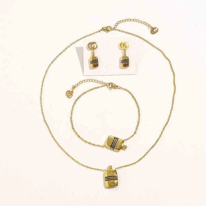 50% rabatt designer smycken armband halsbands ringtillbehör titan stål olja parfym flaskan set kvinnors dubblar örhängen armband