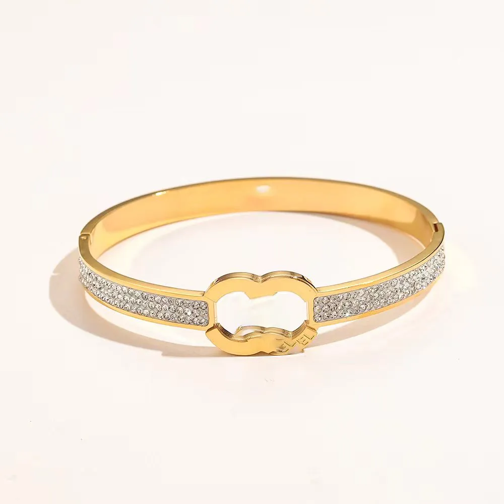 Bracciale rigido con lettera di marca di lusso, gioielli in acciaio inossidabile placcato oro 18 carati con micro pavé per regalo da donna