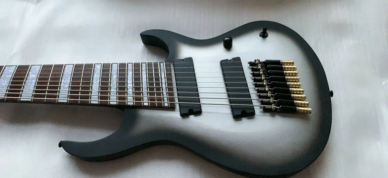 Custom 9-Strings Headless Fanned Frets Bajo eléctrico Silverburst Body 24 Frets Black Hardware