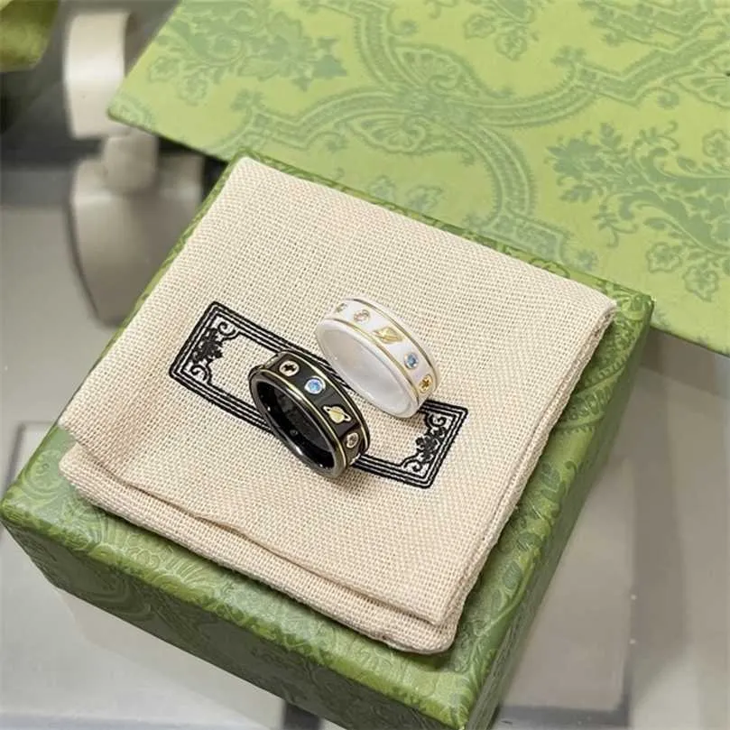 50% off designer jewelry bracelet necklace ring Kmx. black white ceramic bee planet twist inlaid Phnom Penh couple ring