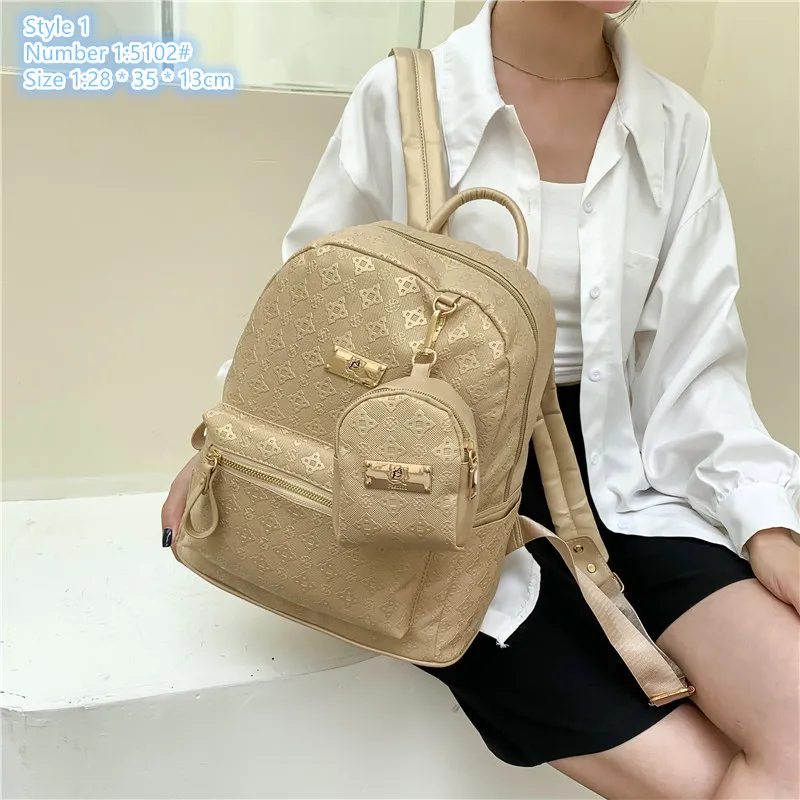 wholesale sac à bandoulière pour dames 2 styles sac à main en relief souple de grande capacité porte-monnaie enfichable sac à dos en cuir décontracté style collégial sacs à dos personnalisés