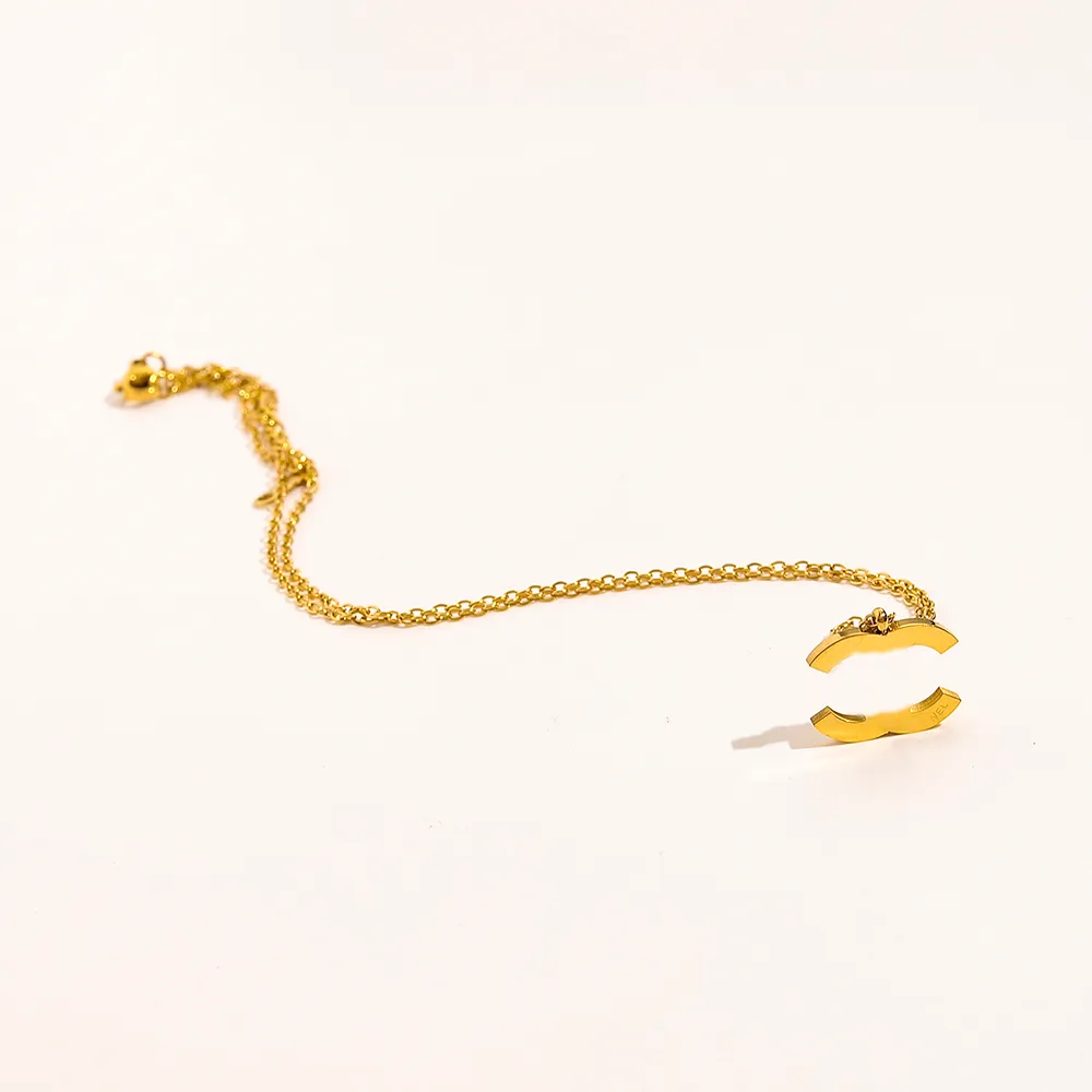 Hurtownia proste designerskie naszyjniki wisiorek słynne marka podwójna litera 18k złota poszyjanie szyjka stalowa łańcuchy obojczyka