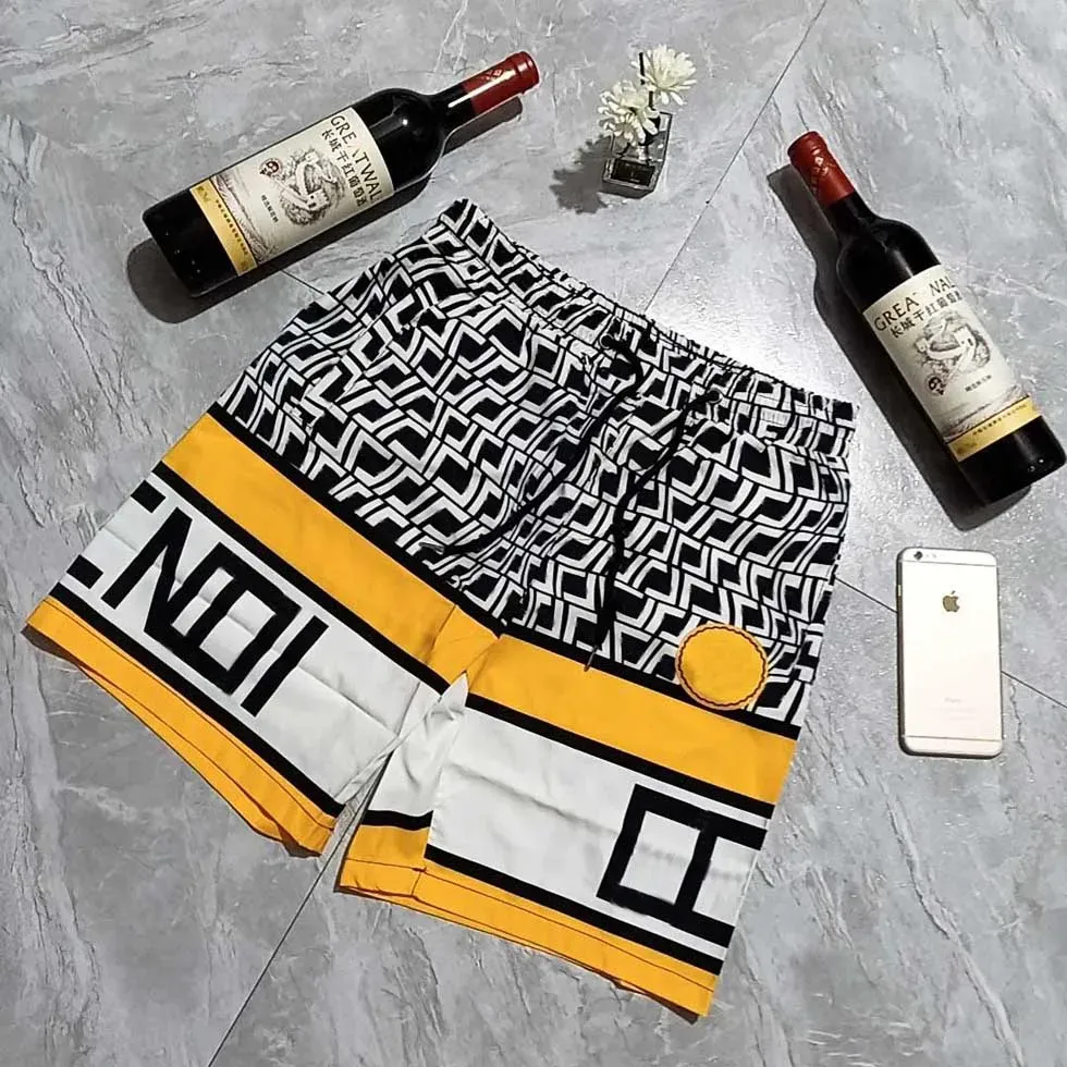 2023 zomer Designer Fashion Shorts voor heren knielengte losse Letterprint dames man ontspannen broek sportkleding M-3XL