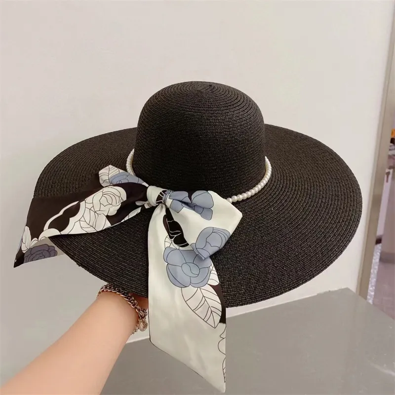 قبعات دلو الأزياء غير الرسمية للسيدات النسائي المصمم الفاخر Sandbeach Straw Hat للجنسين في الهواء الطلق الأنشطة الرياضية Sunshade