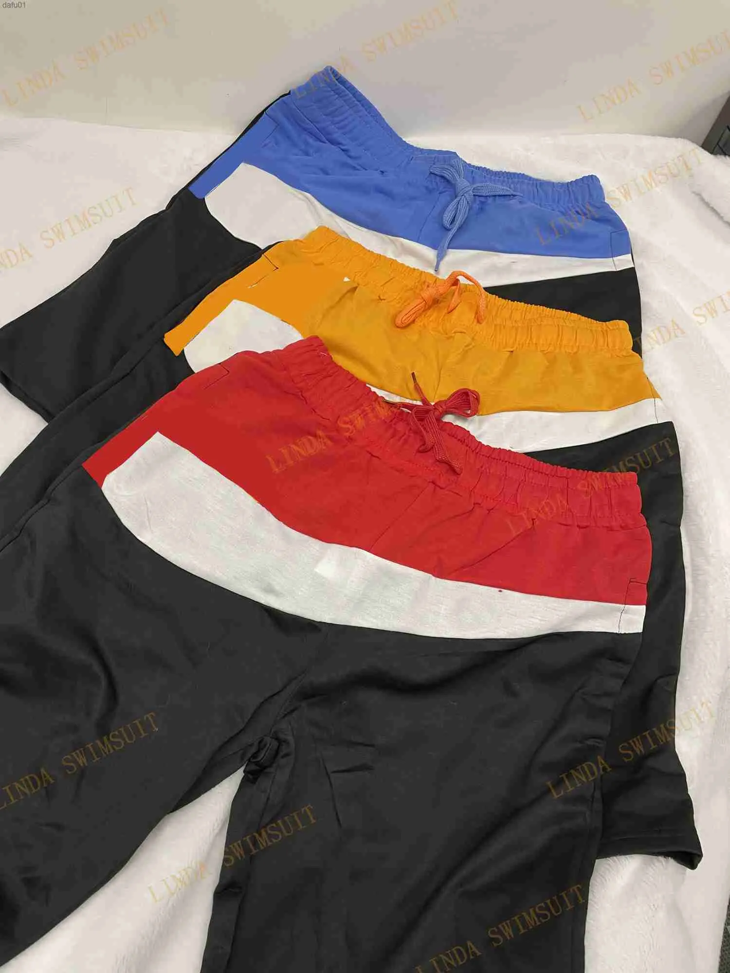Shorts pour hommes pour l'été contton tech tissu multi couleur épissage desinger imprimer Couleurs de couture pantalons de sport décontractés Loose Street Leisure Fashion pantalones