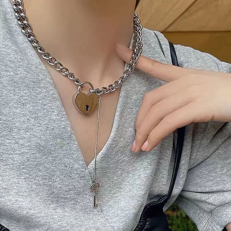 Balenciaga heart on sale locket necklace