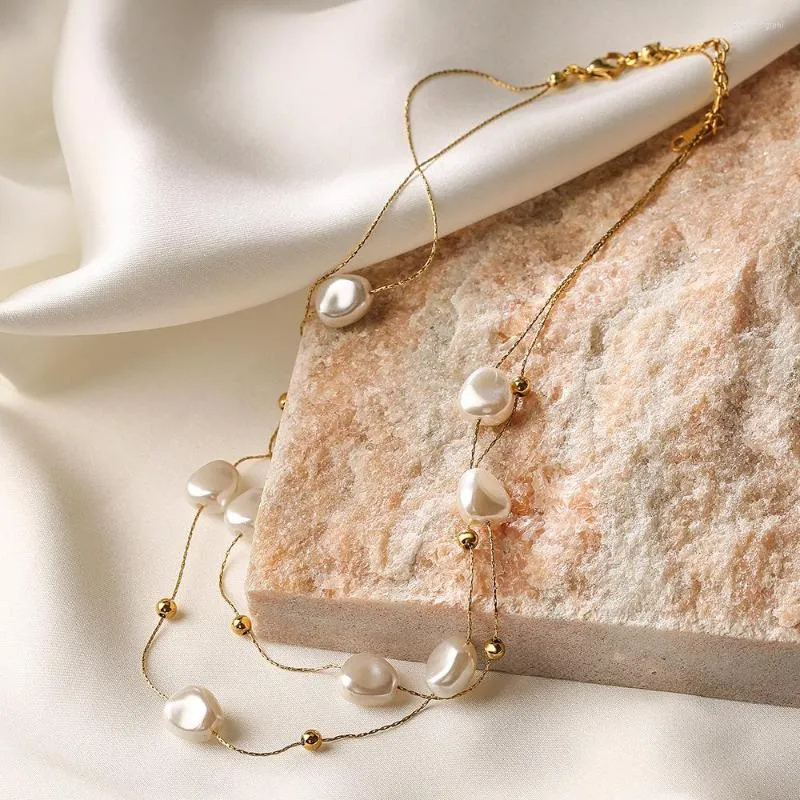 Collane con ciondolo Collana a strati con perle barocche alla moda_voghion.com