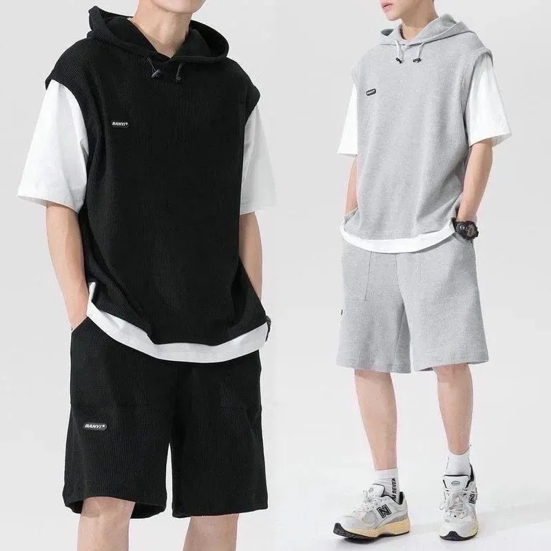 Mens Tracksuits Summer Large Size Sports Suit Breatble Wear Wild High Street Chic Fake Twopiece Tshirt Simple Shorts 230605