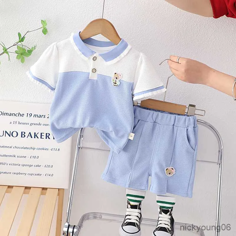 Conjuntos de ropa para niñas, atuendo de verano 2023, camisetas de manga corta de dibujos animados de retazos de estilo coreano, Tops y pantalones cortos, 2 uds., ropa infantil para niñas