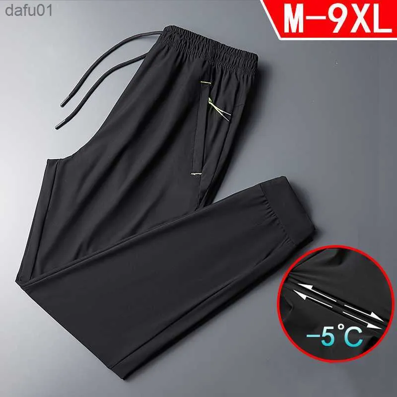 Calças de malha respirável de verão masculinas moda casual joggers calças de moletom masculinas de cor sólida calças elásticas masculinas calças de jogging preta L230520