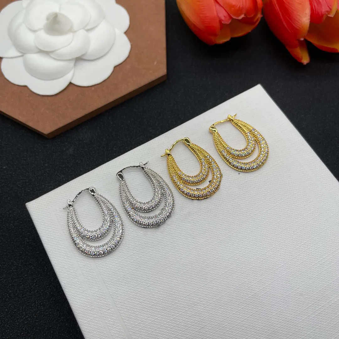 Designer mode kvinnor vatten dropp örhängen enkel rund hänge mässing engagemang örhänge logotyp med kristallsmycken