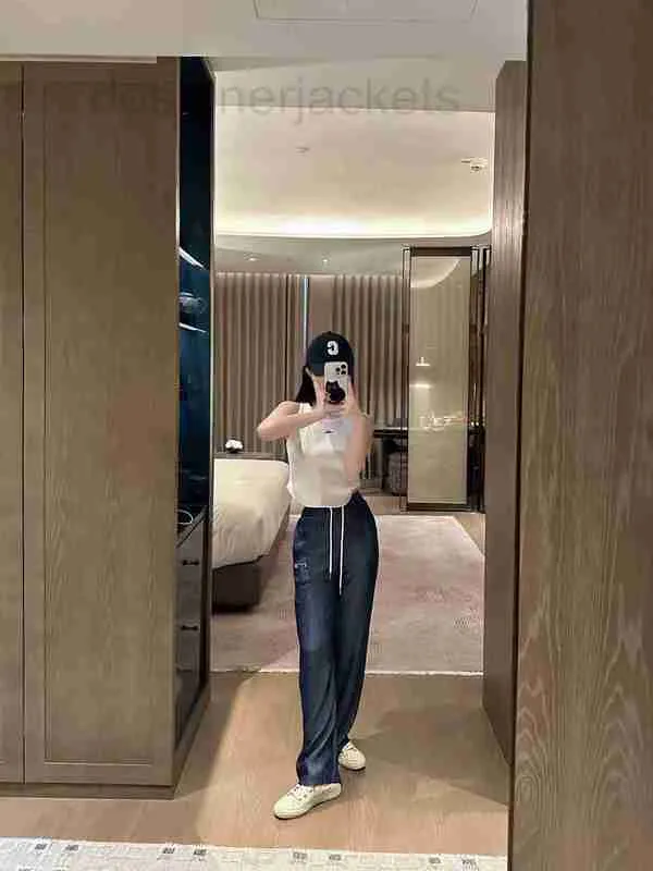 Женские штаны Capris Дизайнер Прямые повседневные брюки для женщин летом 2023 года, тонкая ледяная шелковая джинсовая джинсовая имитация высокая пояс, свободная и тонкая шнурка Long FHS1