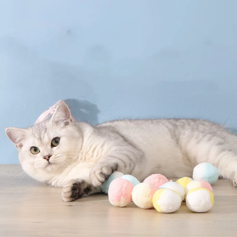 12PCS Śliczne zabawne kota zabawek rozciągnij Plush Ball Ball Ball Kulka Kreatywna kolorowa interaktywna kot pom pom wypustka