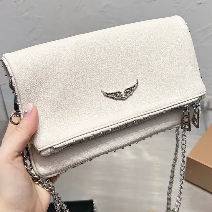 Väskor Designer Wings Diamond-järnväska Kvinnor axelväska Rivet Handväska Crossbody Purse Läder Cross Body Chain Handväskor