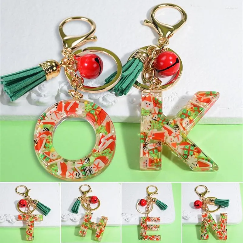 Nyckelringar 26 Brev Nyckelring med Bell Tassel Bag bil Key Chain for Women Gift Mobiltelefon Dekoration Smycken Ringar Tillbehör