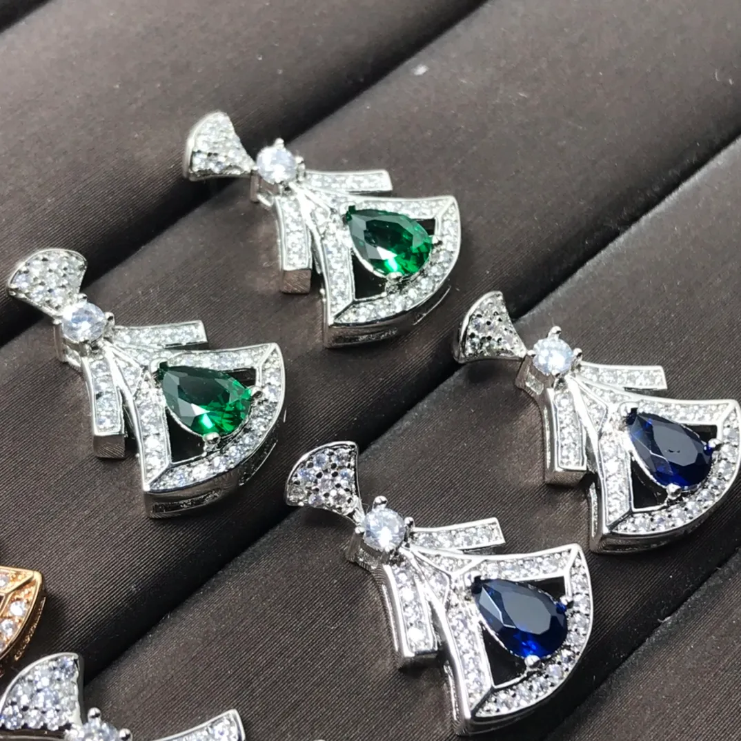 Designer stud earrings on sale deals
