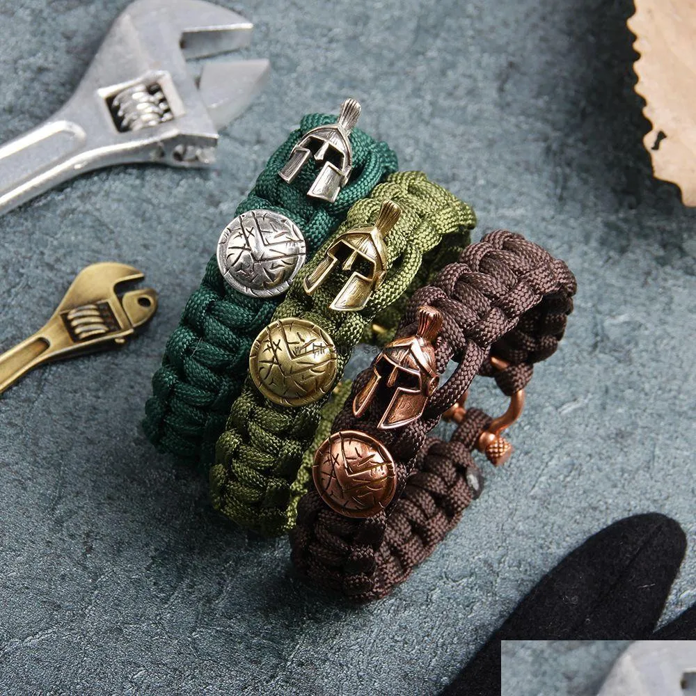 Charm Armbänder Outdoor Survival Core Line Armband Retro Römischer Helm Schild Armreif Manschette für Männer Mode Hip Hop Schmuck Will und D Dhhlv