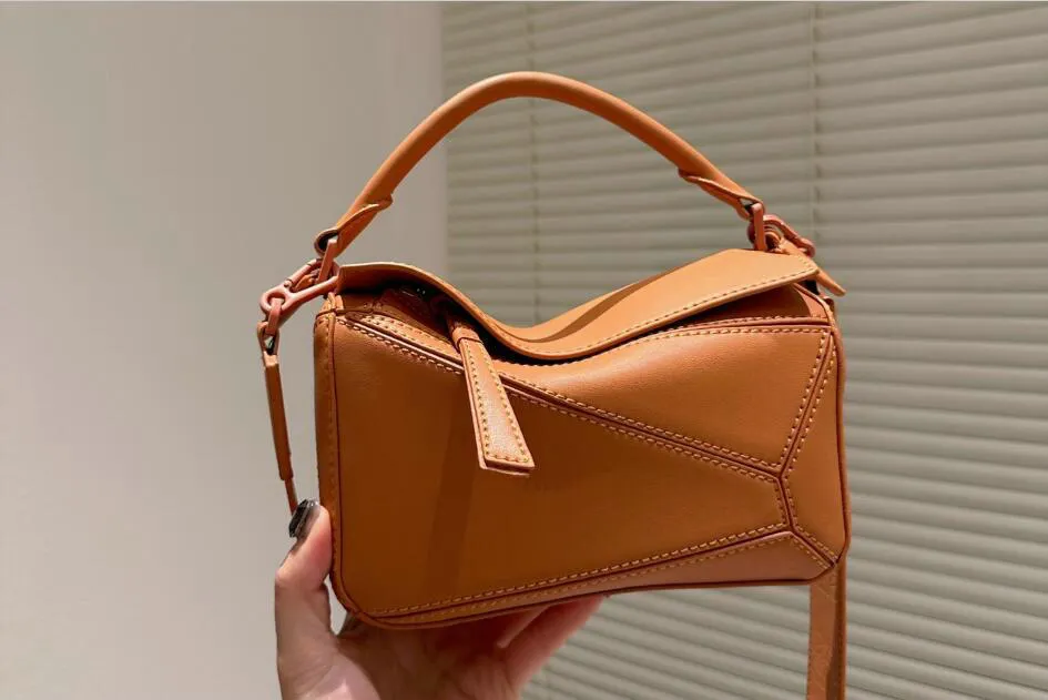 Bolso cruzado Bolsos Diseñador Rompecabezas Bolso bandolera Bolsos de mensajero Cuero real de primera calidad Piel de becerro clásica Mujer Forma cuboide