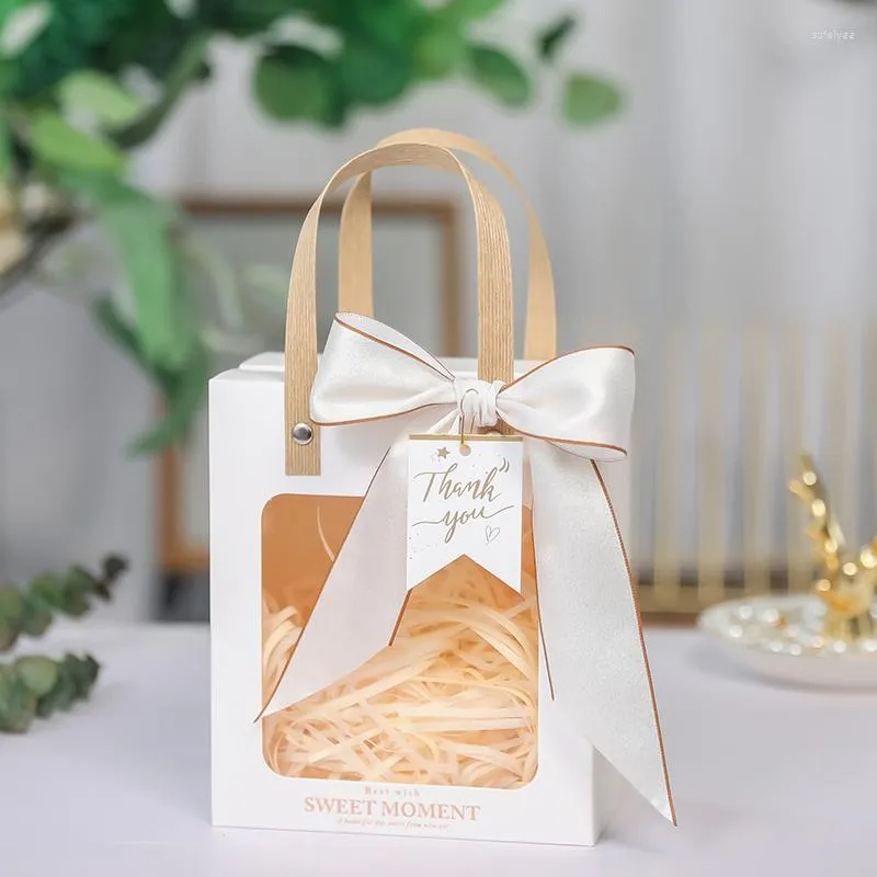 Emballage cadeau 10 pièces/lot sac haut de gamme fenêtre transparente conception tenu dans la main exquis mariage anniversaire petit emballage Carton vide