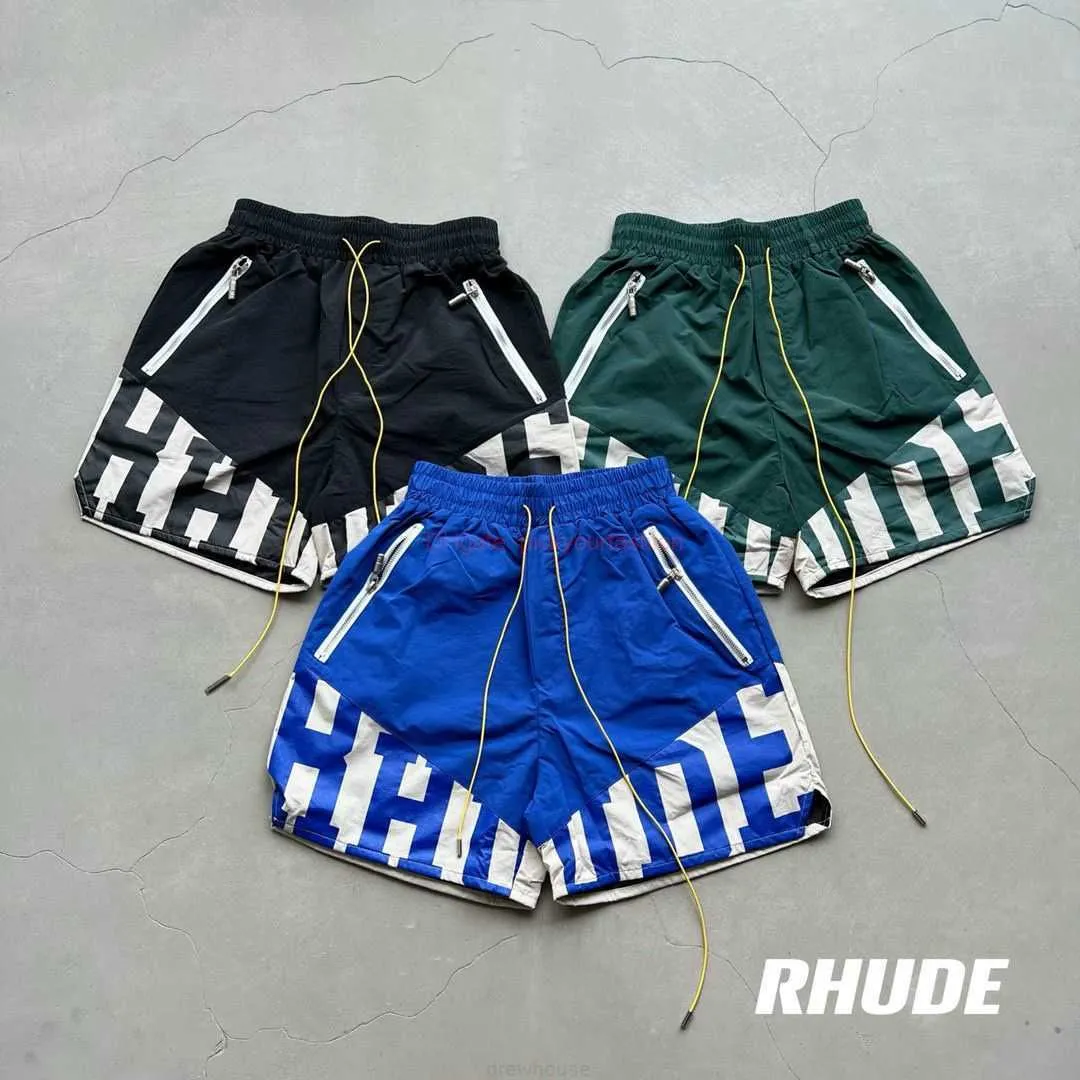 Designer Court Mode Vêtements de loisirs Shorts de plage en conserve Rhude 23fw High Street Industrie lourde Épissé Couple tissé Lâche Capris Joggers Sportswear Outdo