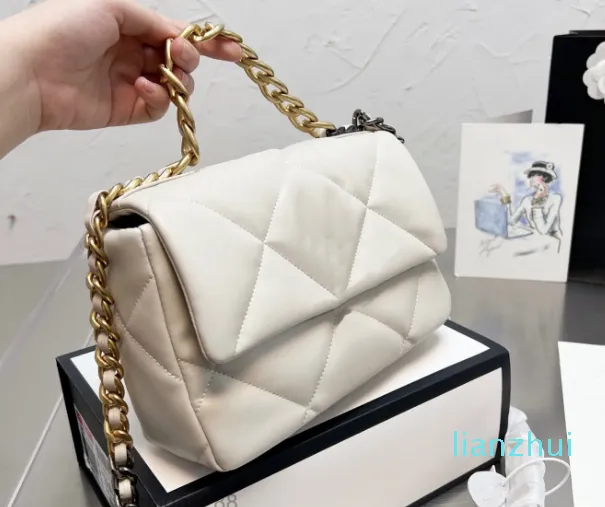 2023 Luxos designers Qualidade Feminina Correntes de tricô Bolsas de mão mãe cossbody parede