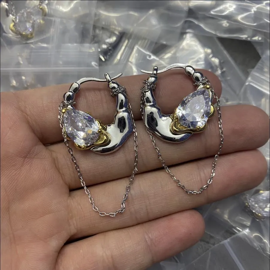 Nouveau cristal blanc irrégularité glands chaîne boucles d'oreilles Style féminin lisse plaqué or blanc clous d'oreilles bijoux de luxe E3023