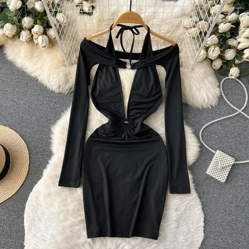 Casual Dresses French Design Sense Niche Careful Machine Hollow Strapless Black Long-sleeved Hanging Neck Type Thin Package Hip Dress
