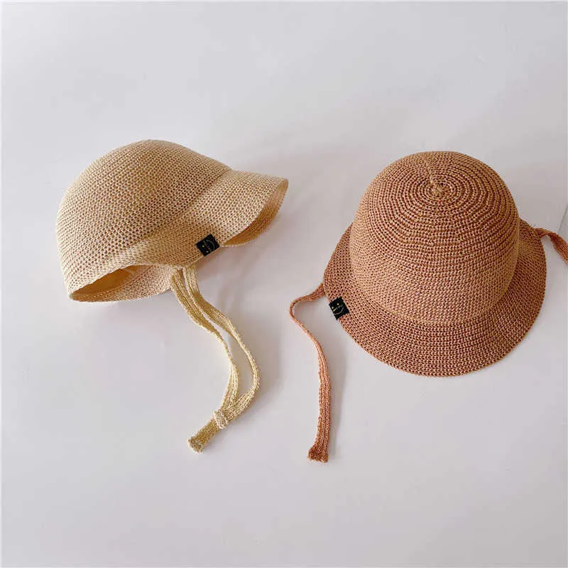 Czapki kapelusze nowe dzieci słomkowe czapkę wiadra dla dziewcząt chłopców letnie czapki duże brzegi ochrona dzieci Sun Cap Baby Stuff przez 2-5 lat