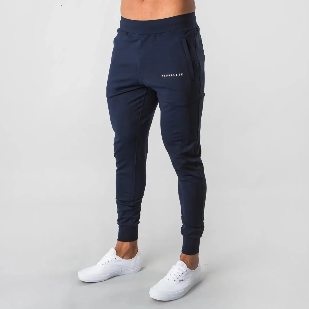 Erkek pantolon Alphalete Style Mens Marka Jogger Sweetpants Adam Spor Salyaçları Egzersiz Fitness Pamuk Pantolonlar Erkek Gündelik Moda Sıska Track Pants 230609