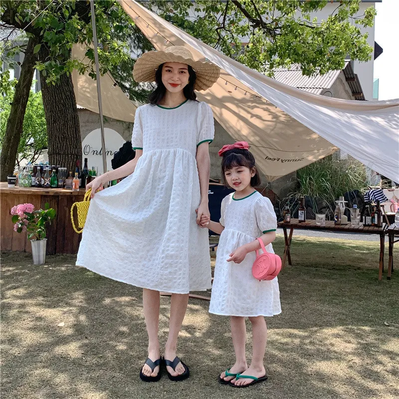 Mom and top daughter white dresses
