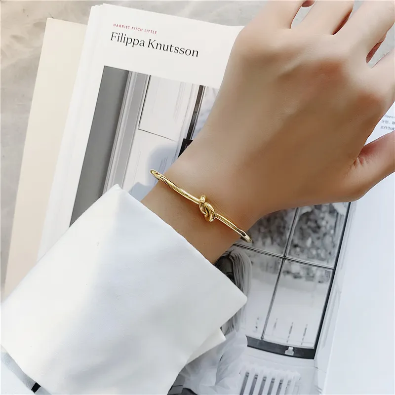 High-end luxe modeontwerper knooparmband titanium staal verguld 18k roségoud essentiële armband voor koppels vakantiegeschenk bedelsieraden