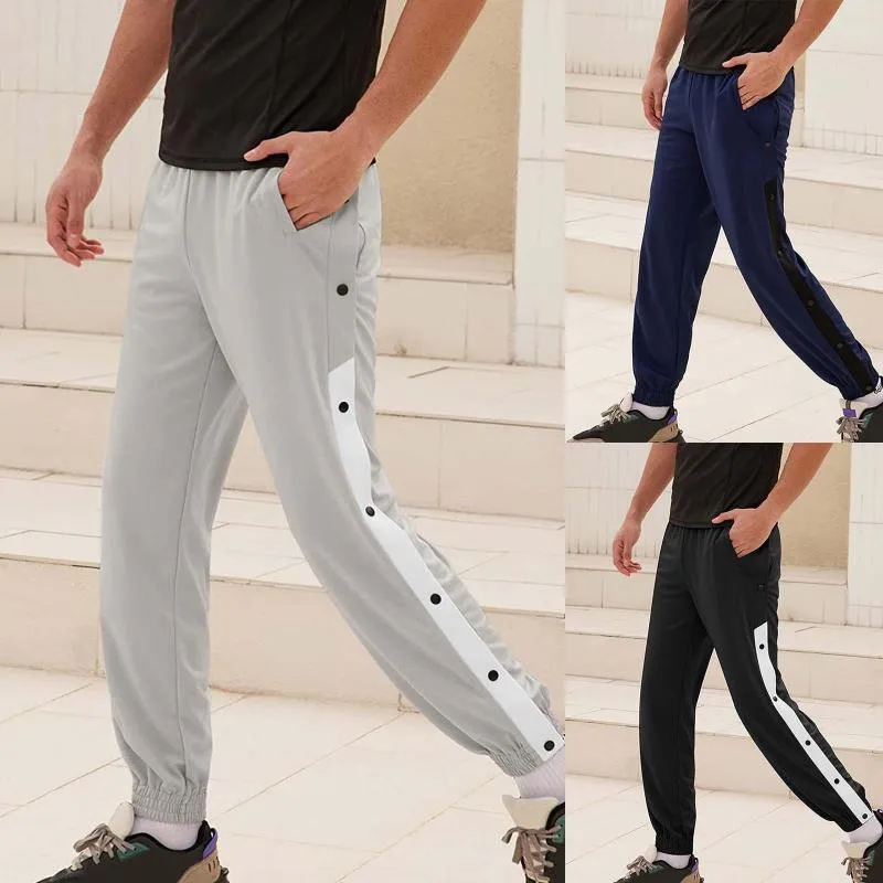 Pantaloni da uomo Uomo Jogger Moda Pantaloni sportivi a righe con bottoni spaccati laterali Pantaloni sportivi da uomo da basket Casual All Match