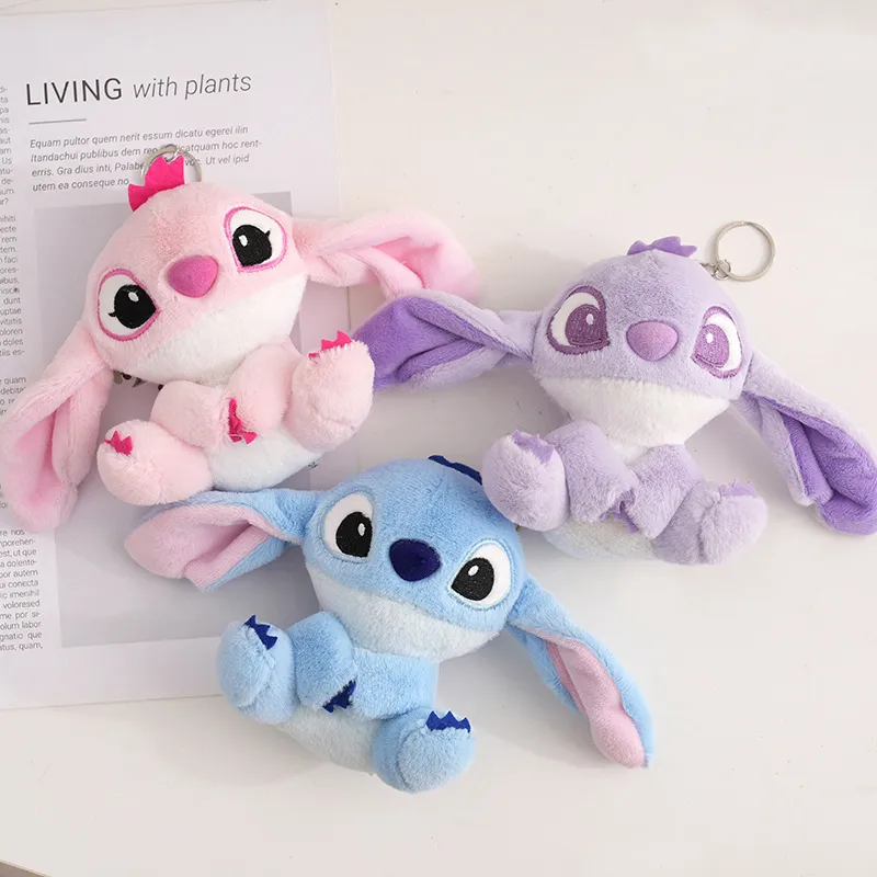 Manufacturers wholesale 3-color 12cm alien dog plush toy key chain cartoon film and television peripheral doll pendant for children's gifts