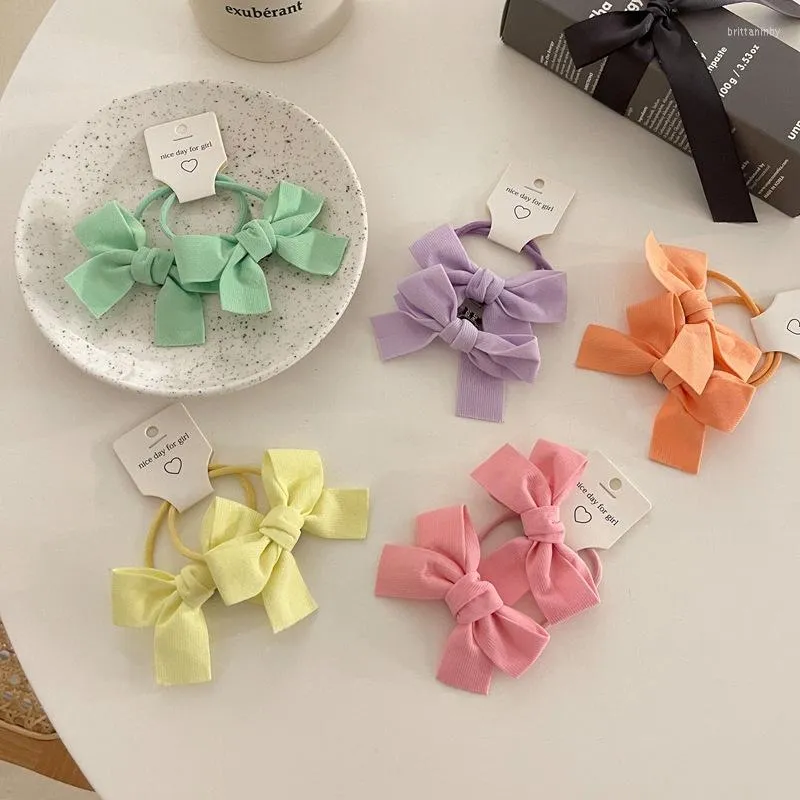 Fermagli per capelli 2 pezzi / set Giappone Corea 2023 INS Fasce per ragazze Colore della caramella Bowknot Grappoli Anello per bambini Accessori moda