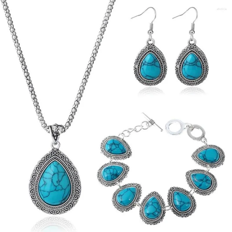 Collana Orecchini Set FYJS Bracciale con pendente a goccia d'acqua placcato argento unico Bracciale in pietra turchese blu