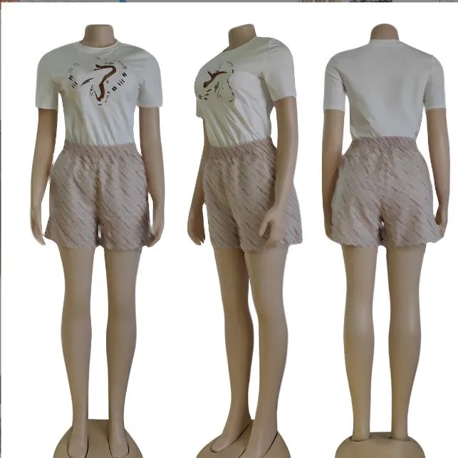 Mode kvinnors designer sportkläder tvådelar sommarbokstav tryckt kortärmad t-shirt och shorts set casual t-shirt shorts sport set j2830