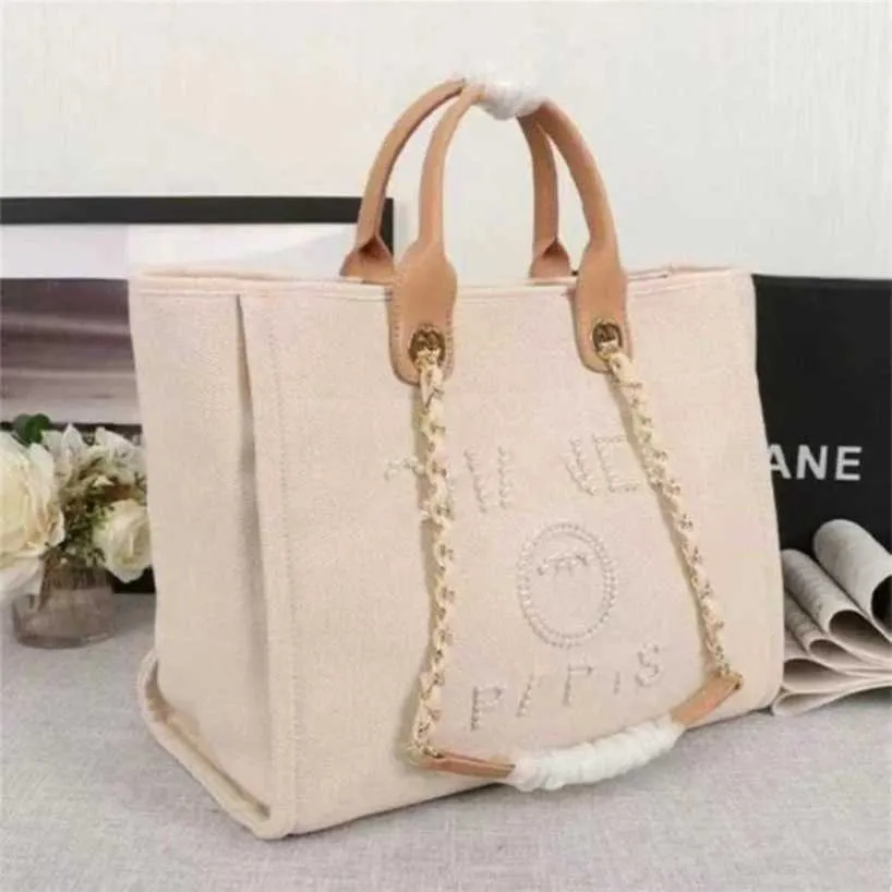 Klassisk modedesigner Evening Påsar Luxury Handbag Pearl Etikett Ryggsäck Kvinnor strandhandväskor Purse Kvinnor Canvas Handväska damer 75% Billigt utlopp grossist 1CF2