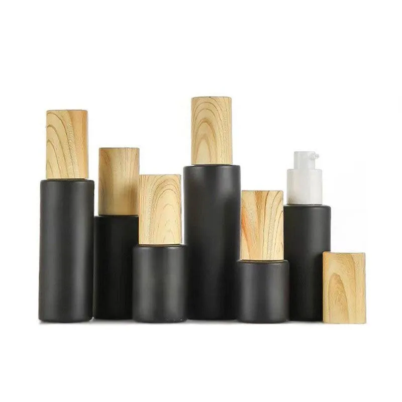 Frascos de bomba de vidro vazios recarregáveis frascos de loção de vidro fosco preto frasco de spray de óleo essencial com tampa de plástico de grão de madeira 20ml - 80m Pptm