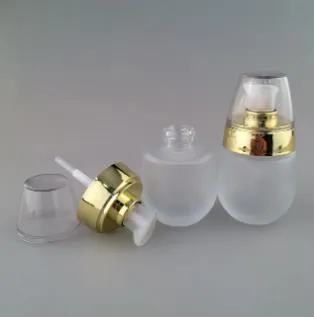 金色の蓋、透明なフロスト1オンスのプレスポンプボトル、ガラス30 ml化粧品コンテナガラスボトル卸売