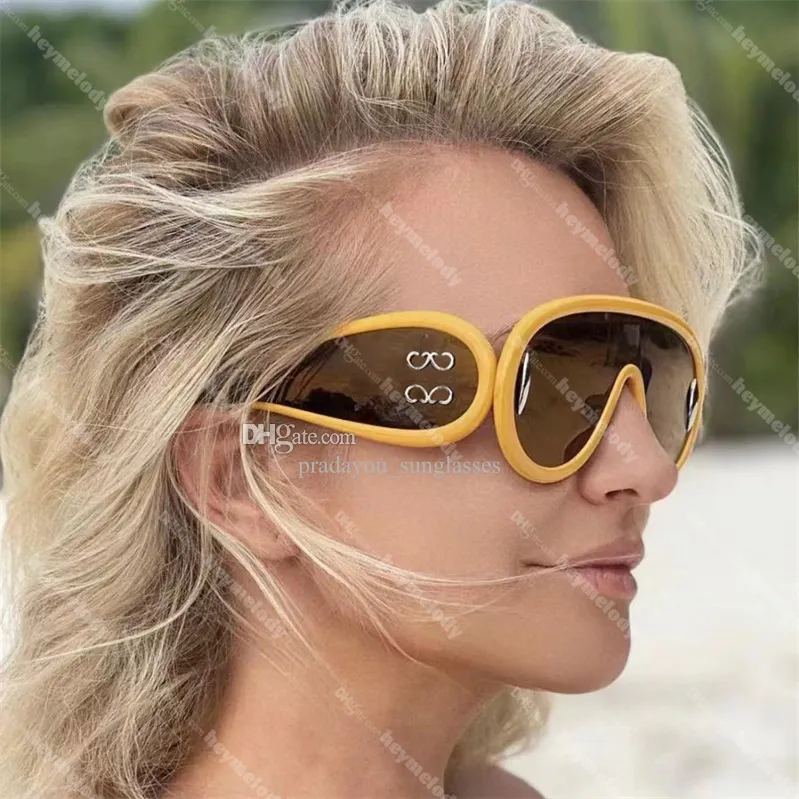 Óculos de sol de armação grande quente Personalidade Óculos de sol com lentes coloridas Óculos de sol com lentes conjuntas