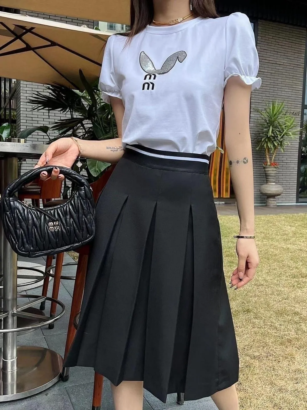 المصمم MIUI للسيدات القصيرة الطويلة التنانير الصيفية Girls Classic Tirt Tirp Top Mini Maxi Jaxi Trild Black A-Line Skirt Small Leather Dress