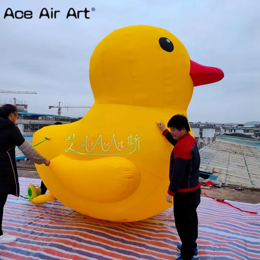Desenho de pato amarelo inflável gigante 5mH para publicidade de exibição de evento de festa ao ar livre