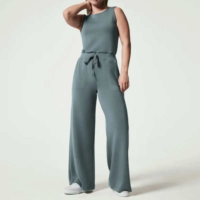 Sport kvinnors rompers luft jumpsuit våren solid jumpsuits för kvinnor avslappnad lös kort ärm bälte bred benbyxor romper 230615 2024 het