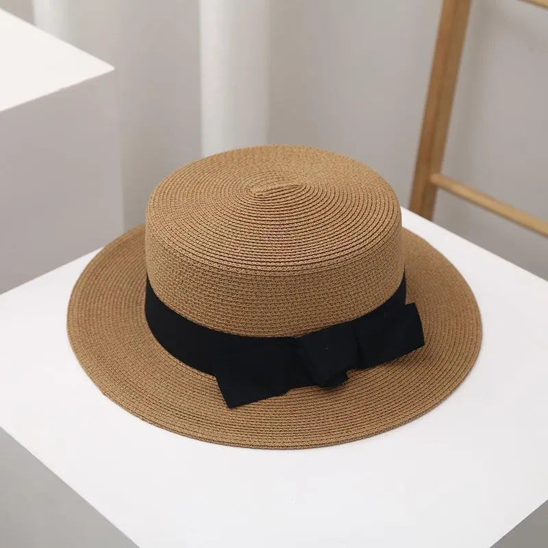 Szerokie czapki z czapek wiadra czapki retro kapelusz dla kobiet panama słomy kapelusz letni UV Ochrona Sun Hat Wide Brim Fedora Cap Ladies Flat Top Hat 230615