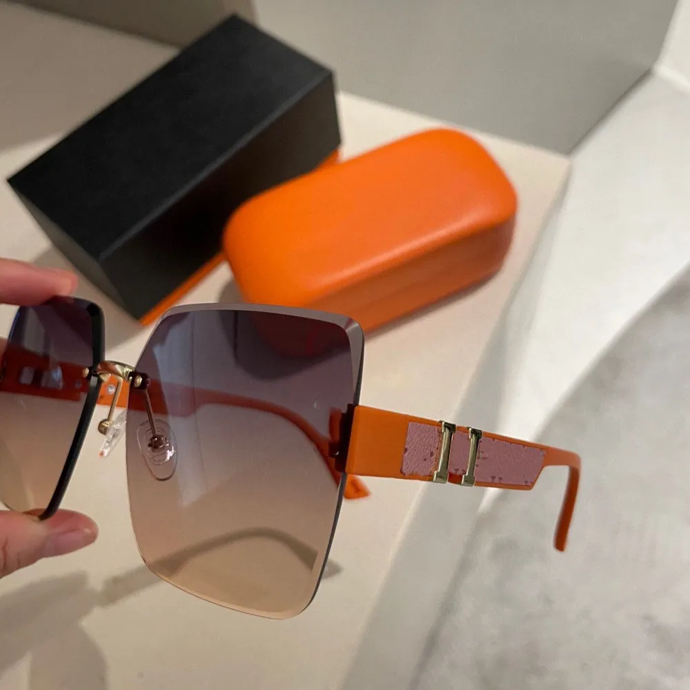 2023 büyük yüz çerçevesiz yeni model birinci sınıf karışık renkli lensler yüksek kaliteli büyük boyutlu kadın güneş gözlükleri klasik şık ve gündelik stil plaj sürüşü için