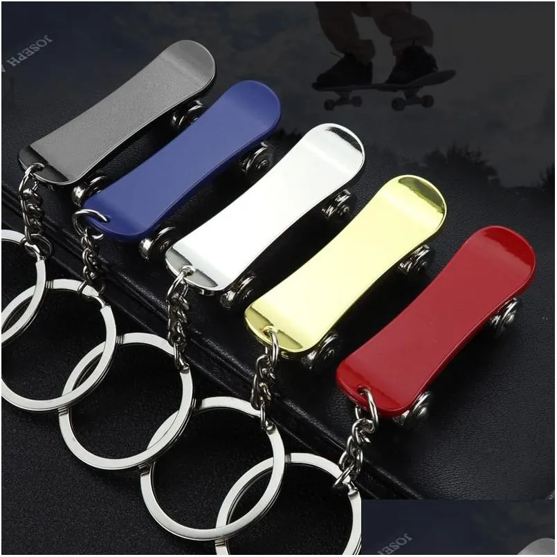 Key Rings Metal Rotatable Skateboard Keychain Pendant Handbag Hangs Fashion Jewelry For Women Mens Gift Will And Sandy Drop Delivery Dhpul