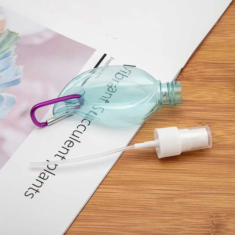 Nieuwe 50 ml Reizen Draagbare Lekvrije Lege Hervulbare Container Reizen Plastic Clear Sleutelhanger Fles Bladvorm Reizen Spray Fles