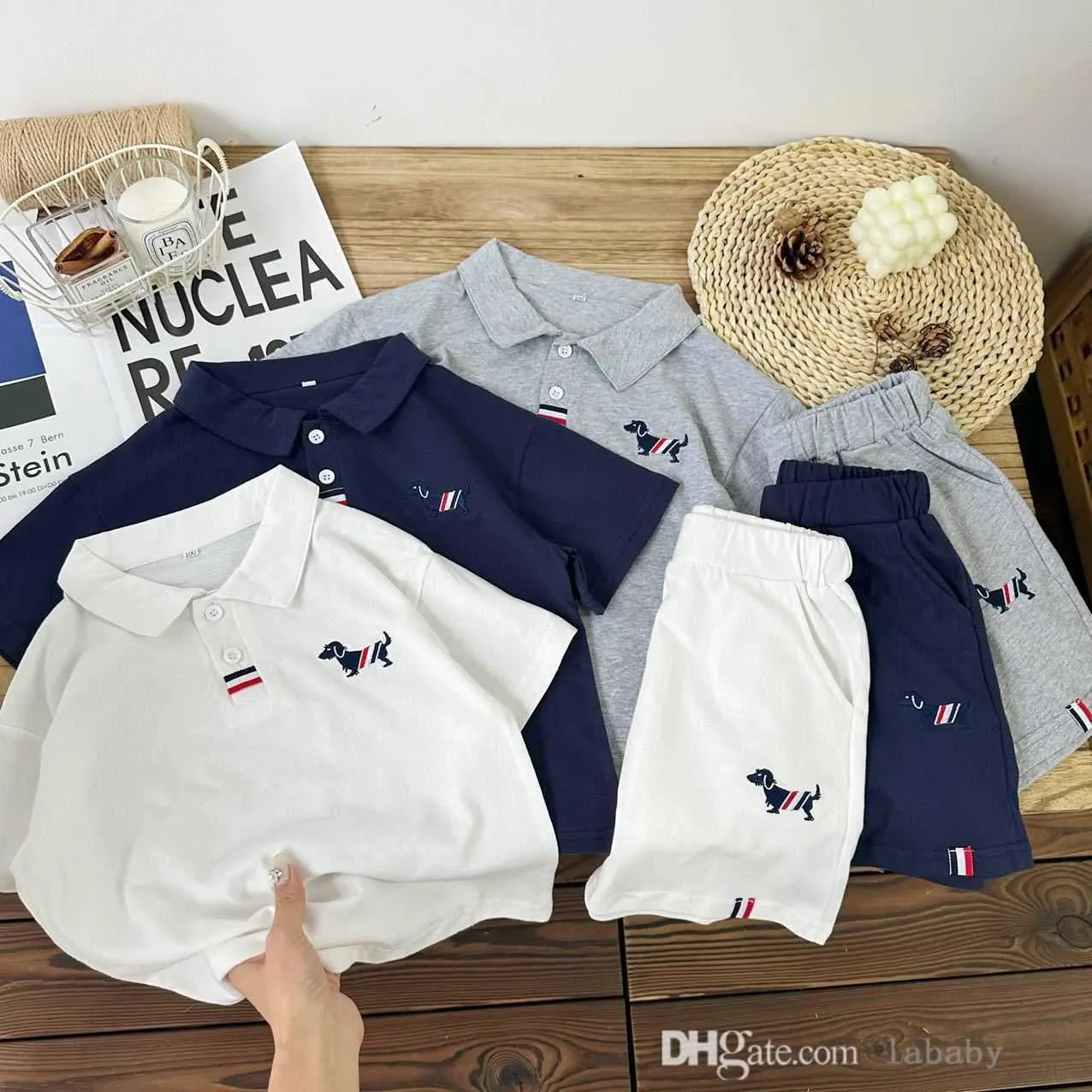 Enfants survêtement vêtements 2023 été nouveau chien motif deux pièces ensemble garçons et filles Polo chemise Shorts pur coton 2 pièces bébé ensembles costumes